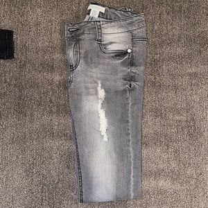 Size womens 0 jeans grey with rip tears cute